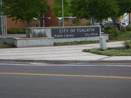 Sign for City of Tualatin Public Library and City Offices - sidewalks - parking lot Sign for City of Tualatin Public Library and City Offices - sidewalks - parking lot